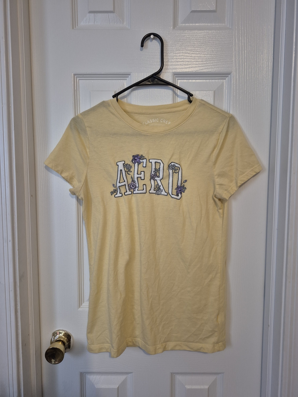 Aeropostale Pale Yellow Tee with Purple Floral Logo